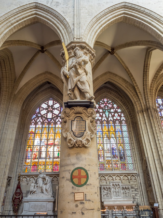 The interior decoration and architecture of Saint Michael and Saint Gudule Cathedral in Brussels, Belgium, under clear blue skyのeditorial素材
