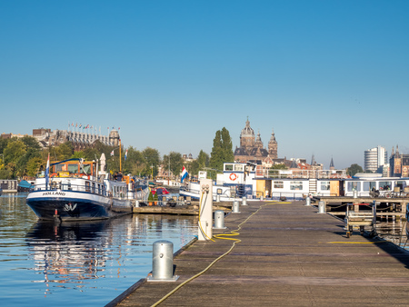 City scene in Amsterdam with St.Nicholas church viewの写真素材