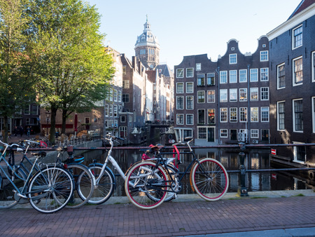 AMSTERDAM - OCTOBER 2: Saint Nichlas church fromt red light district under blue sky in Amsterdam, Netherlands, was taken on October 2, 2015.のeditorial素材