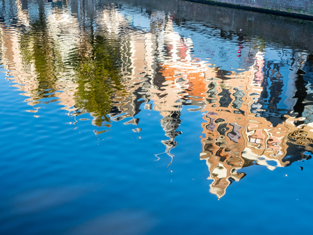 Reflection in water of buildings in main red light district in Amsterdam, Netherlandsの写真素材