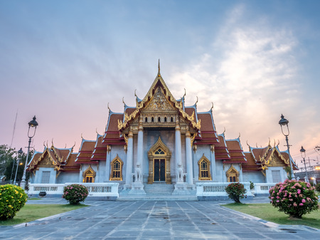 The Marble temple church building, Wat Benjamabophit, one of landmark in Bangkok, under beautiful twilight evening sky, Thailandの写真素材