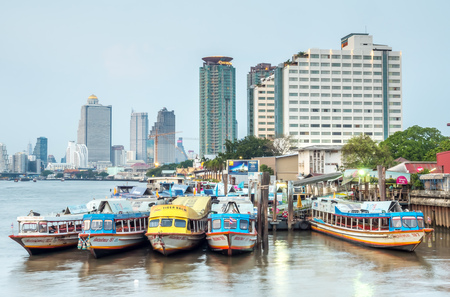 BANGKOK - MAY 14: Night light view of skyscraper buildings in Bangkok along Chaophraya river, landmark buildings of Bangkok, Thailand, on May 14, 2016.のeditorial素材