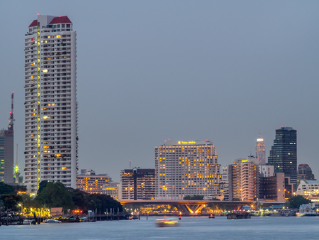 BANGKOK - MAY 14: Night light view of skyscraper buildings in Bangkok along Chaophraya river, landmark buildings of Bangkok, Thailand, on May 14, 2016.のeditorial素材