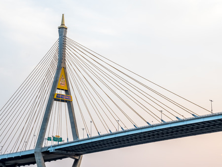 Huge bridge name Bhumiphol bridges cross Chaophraya river in Bangkok under white cloudy sky in...