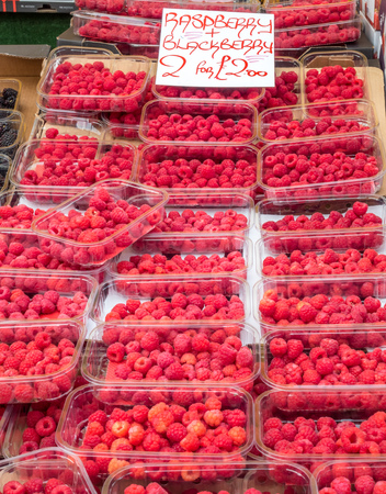 Outdoor market in England sell raspberry with reasonable price