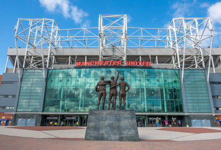 MANCHESTER - MAY 22: Holy Trinity of Best, Law and Charlton statue at front side of Old Trafford...