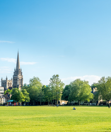 CAMBRIDGE - MAY 23 : Green grass relax outdoor park with cloudy blue sky in Cambridge, England, was taken on May 23, 2016.のeditorial素材