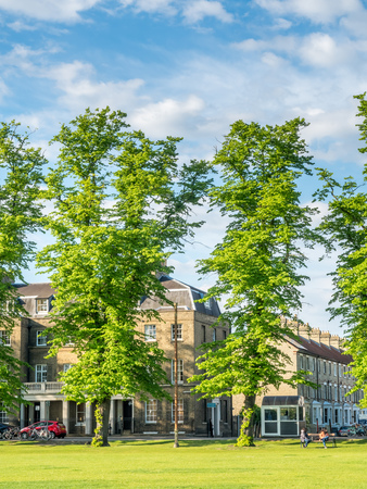CAMBRIDGE - MAY 23 : Green grass relax outdoor park with cloudy blue sky in Cambridge, England, was taken on May 23, 2016.のeditorial素材