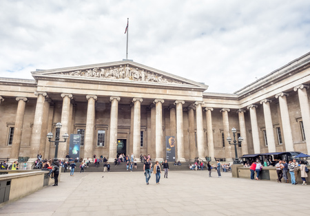 LONDON - MAY 24: Front view of British museum, the Greek facade is characteristic building, established since 1753, located in London, England, was taken on May 24, 2016.のeditorial素材
