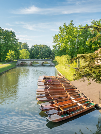 CAMBRIDGE - MAY 23: Wooden punts in Cam river for student stroking in Cambridge, England, on May 23,...