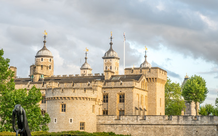 Tower of London, the strong fortress near river Thames in London, England, under cloudy evening skyのeditorial素材