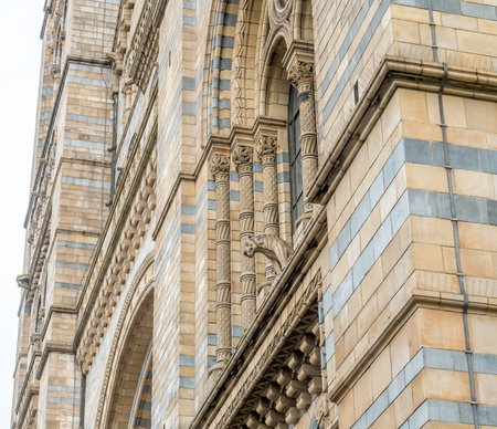 Exterior architecture, window archs and sculpture of Natural History Museum in London, Englandのeditorial素材