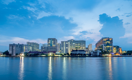 Siriraj Hospital, the first hospital and medical school in Thailand, located along Chaophraya river in Bangkok, under cloudy evening skyのeditorial素材