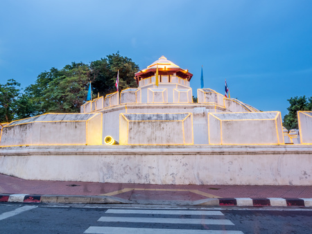 Old style fortress, Mahakarn fortress, with traffic night light movement under twilight evening sky in Bangkok, Thailandのeditorial素材
