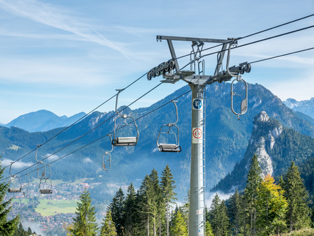 OBERAMMERGAU - OCTOBER 13: Kolben chair lift with cable structures in Kolbensattel mountain in Oberammergau, Germany, on October 13, 2016.のeditorial素材
