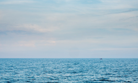 Sea and evening sky horizon for backgroundの写真素材