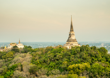 Phra Nakorn Kiri (Palace on the hill) is landmark of Petchaburi city in Thailand with old classic buddhist pagoda, under evening skyのeditorial素材