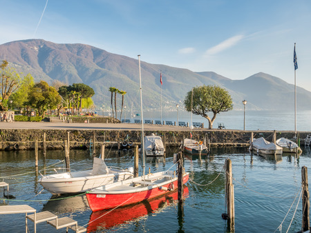 LOCARNO - APRIL 7 : Yacht boats float on bay in Lake Maggiore in Locarno, Switzerland, on April 7, 2017.のeditorial素材