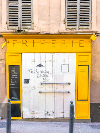 MARSEILLE - APRIL 11 : Colorful door decoration at side of walking street in Marseille, France, on April 11, 2017.のeditorial素材