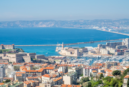 Cityscape landmark viewpoint of Marseille, from Notre-Dame de la Guard catholic church, under clear blue sky in Franceの写真素材