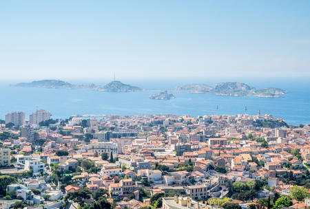 Cityscape landmark viewpoint of Marseille, from Notre-Dame de la Guard catholic church, under clear blue sky in Franceの写真素材