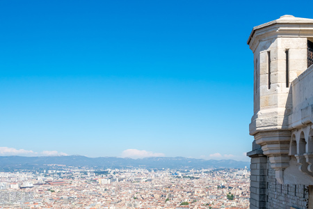 Cityscape landmark viewpoint of Marseille, from Notre-Dame de la Guard catholic church, under clear blue sky in Franceの写真素材