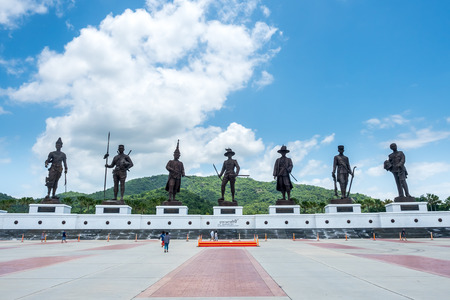 PRACHUAPKHIRIKHAN, THAILAND - JULY 31 : Great Seven Thail king statues at Rachaphak park in Huahin, Prachuapkhirikhan, Thailand, under cloudy blue sky, on July 31, 2017.のeditorial素材