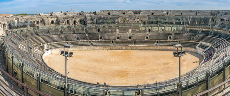 Panoramic wide oval view of interior architecture of Arena of Nimes, ancient Roman amphitheater, in Franceのeditorial素材