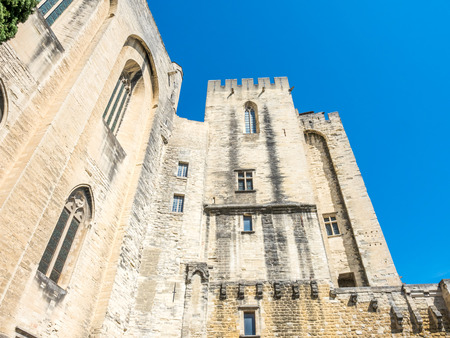 Exterior design architecture of Papal palace (Palais des papes) under clear blue sky in Avignon, Franceのeditorial素材