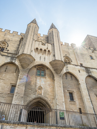 Exterior design architecture of Papal palace (Palais des papes) under clear blue sky in Avignon, Franceのeditorial素材