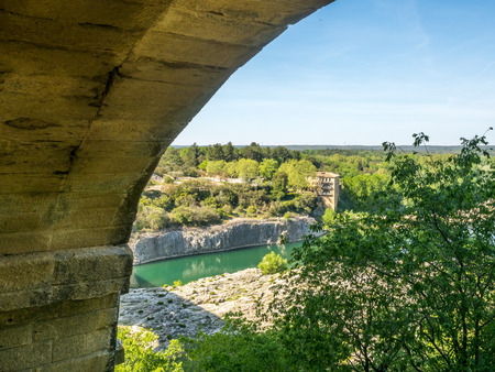Pont du Gard, ancient Roman aqueduct, crosses Gardon river, indicates intelligent of Roman enginerring, located in Nimes, Franceの写真素材