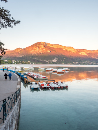 Boats dock at pier in lake in Annecy, France, on April 13, 2017.の写真素材
