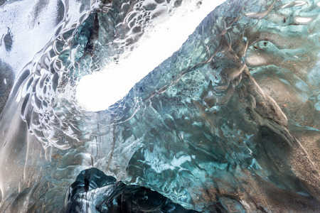 Ice tunnel between valley near glacier in Iceland. Destination landmark of travel in winter season.の写真素材