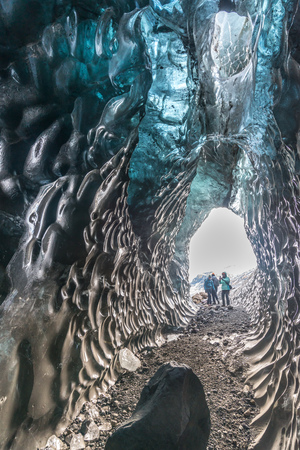 Ice tunnel between valley near glacier in Iceland. Destination landmark of travel in winter season.のeditorial素材