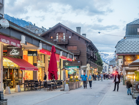 CHAMONIX-MONT-BLANC, FRANCE - APRIL 15 : Scene in Chamonix-Mont-Blanc town in France, one of the oldest ski resort town, with tourists walk in town, on April 15, 2017.のeditorial素材