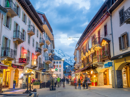 CHAMONIX-MONT-BLANC, FRANCE - APRIL 15 : Scene in Chamonix-Mont-Blanc town in France, one of the oldest ski resort town, with tourists walk in town in evening twilight time, on April 15, 2017.のeditorial素材