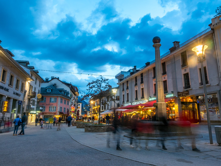 CHAMONIX-MONT-BLANC, FRANCE - APRIL 15 : Scene in Chamonix-Mont-Blanc town in France, one of the oldest ski resort town, with tourists walk in town in evening twilight time, on April 15, 2017.のeditorial素材