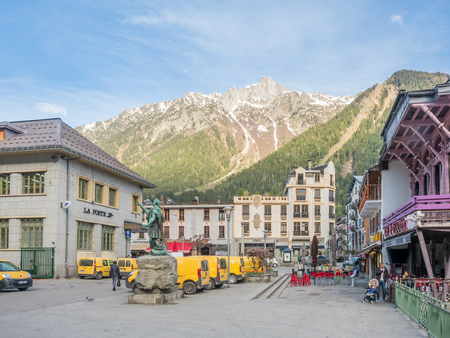 CHAMONIX-MONT-BLANC, FRANCE - APRIL 15 : Scene in square in Chamonix-Mont-Blanc town in France, one of the oldest ski resort town, with tourists walk in town, on April 15, 2017.のeditorial素材