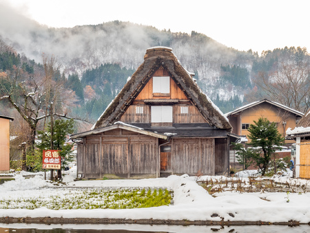 GIFU, JAPAN - NOVEMBER 25 : Gassho-zukuri unique architecture house in Shirakawa village, the UNESCO world heritage place, with snow in early winter season in Gifu, Japan, on November 25, 2017.のeditorial素材