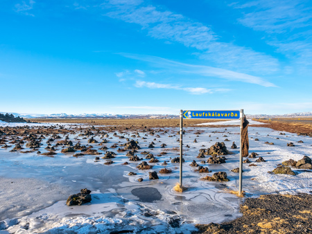 LaufskÃ¡lavarÃ°a, lava ridge between river, surrounded with stone cairns, just side of golden ring road in Iceland. In winter season, field becomes ice and snow.の写真素材