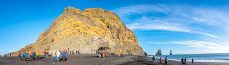VIK, ICELAND - MARCH 3 : Panoramic view of basalt rock mountain and Reynisfjara black sand beach in...