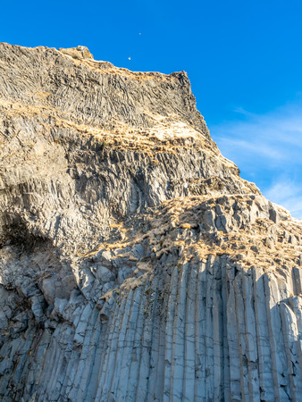 Strange basalt rock mountain near Reynisfjara black sand beach in Vik town, one of the landmark of Icelandの写真素材