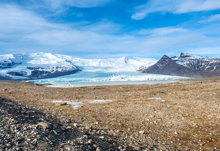 Fjallsarlon glacier, one of famous iceberg lagoon, become hard ice in winter season at south end of Icelandの写真素材