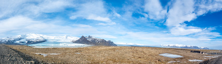 Fjallsarlon glacier, one of famous iceberg lagoon, become hard ice in winter season at south end of Icelandの写真素材
