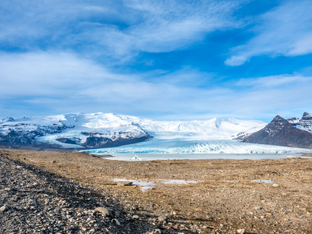 Fjallsarlon glacier, one of famous iceberg lagoon, become hard ice in winter season at south end of Icelandの写真素材