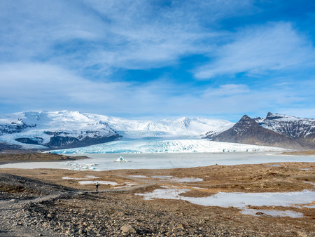Fjallsarlon glacier, one of famous iceberg lagoon, become hard ice in winter season at south end of Icelandの写真素材