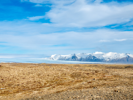 Fjallsarlon glacier, one of famous iceberg lagoon, become hard ice in winter season at south end of Icelandの写真素材