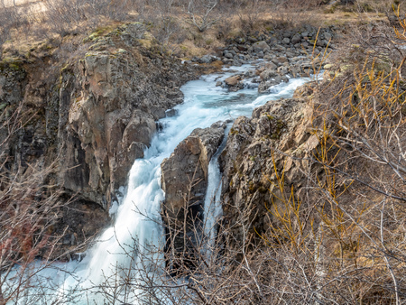 Hundafoss waterfall near Svartifoss in winter season with frozen river, one of destination landmark in Icelandの写真素材