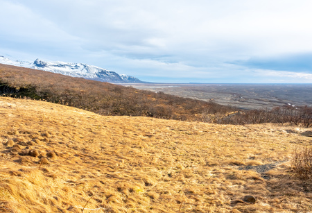 Landscape view in Skaftafell national park, near Svartifoss waterfall in winter season under cloudy sky in Icelandの写真素材