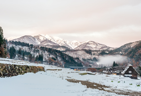 Leafless mountains near Shirakawa village, covered with snow in early winter season in Gifu, Japanの写真素材
